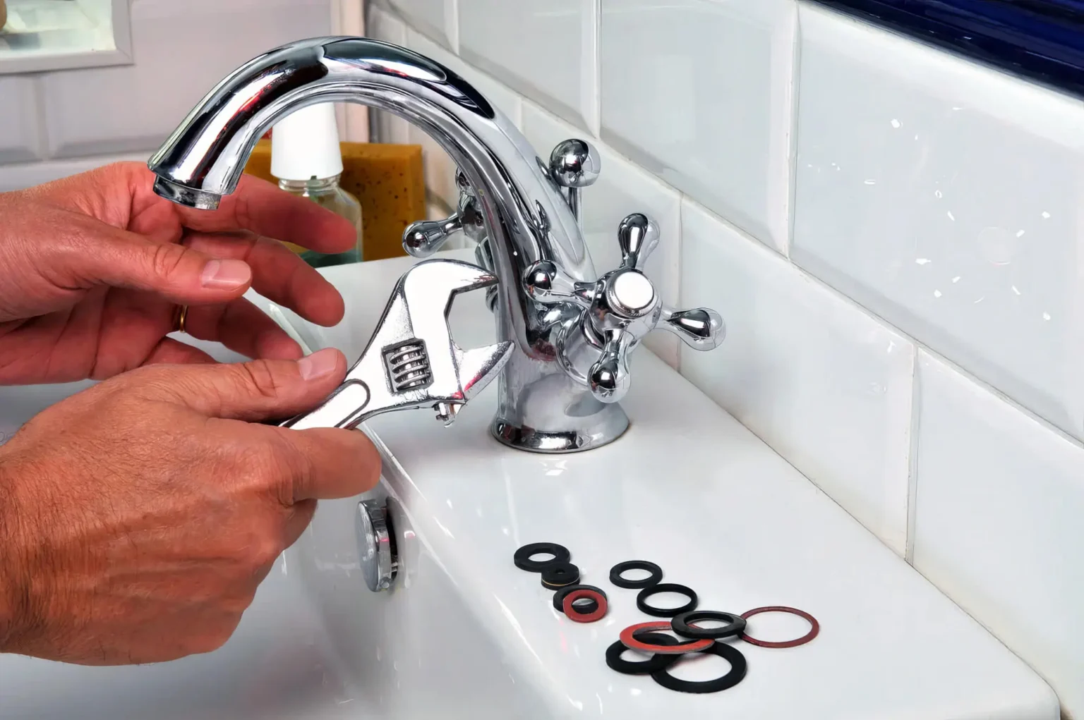 Plumber maintaining a bathroom faucet in Arcadia